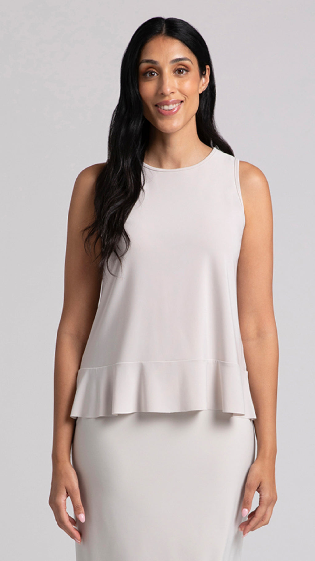 Sleeveless Peplum Top-Solid Colours